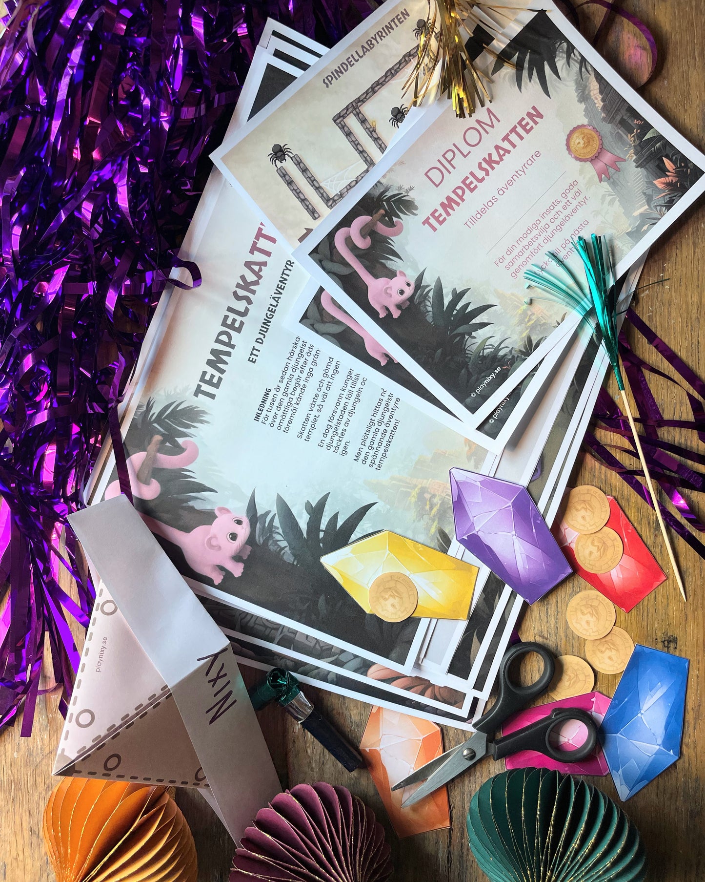 Stack of adventure game papers with decorative items on a wooden surface